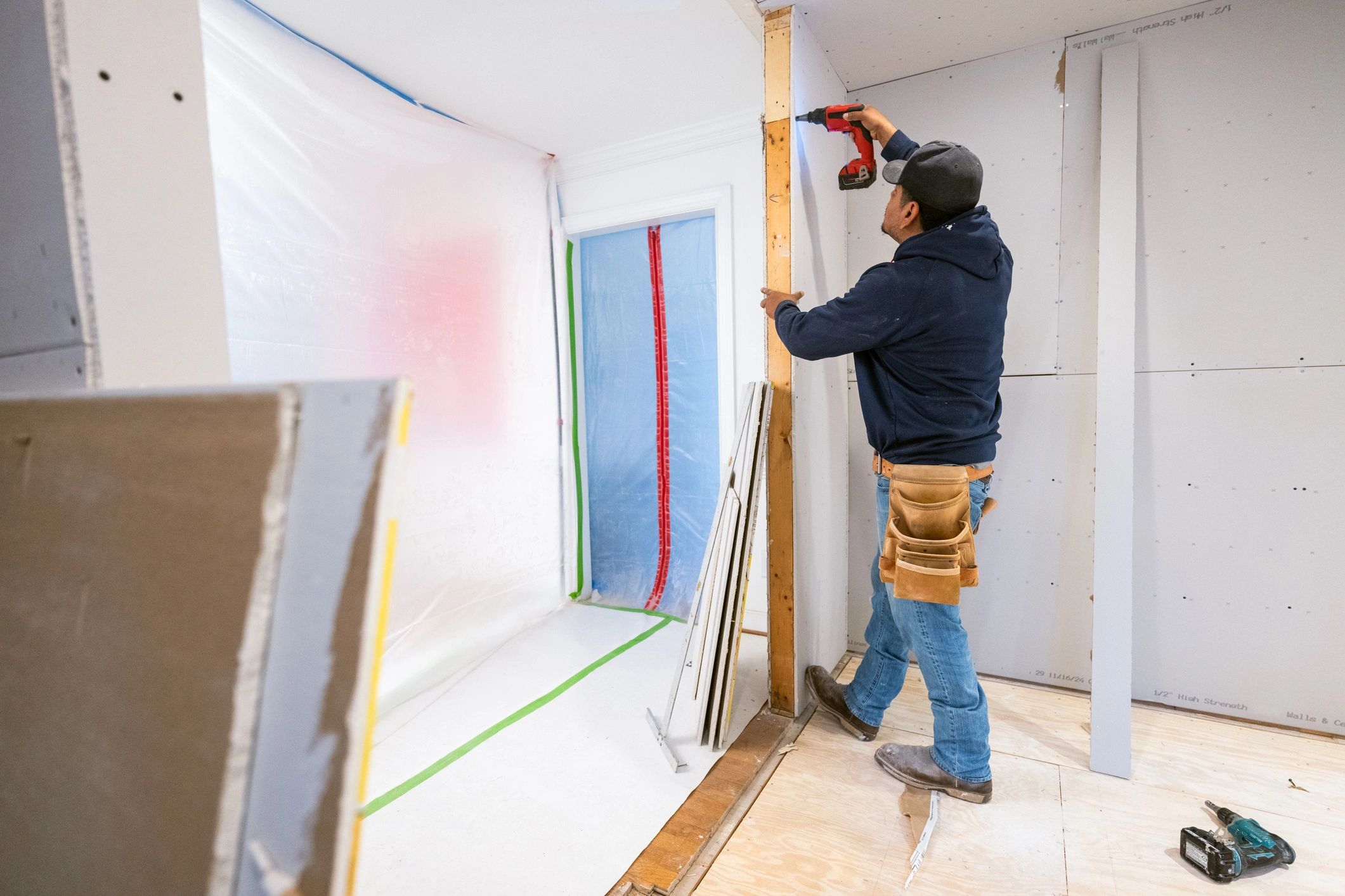 Fire curtain installation in progress